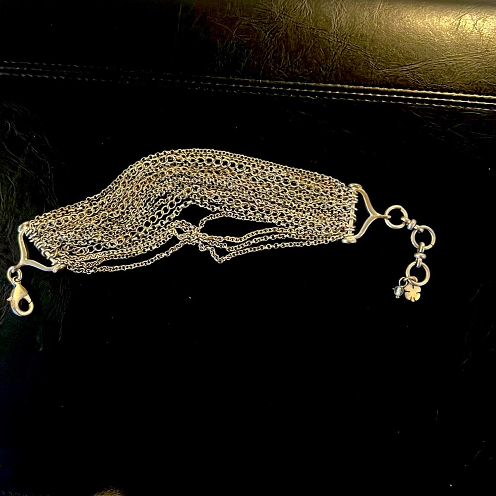 Stylish Lucky Brand Silver bracelet with hook closure.